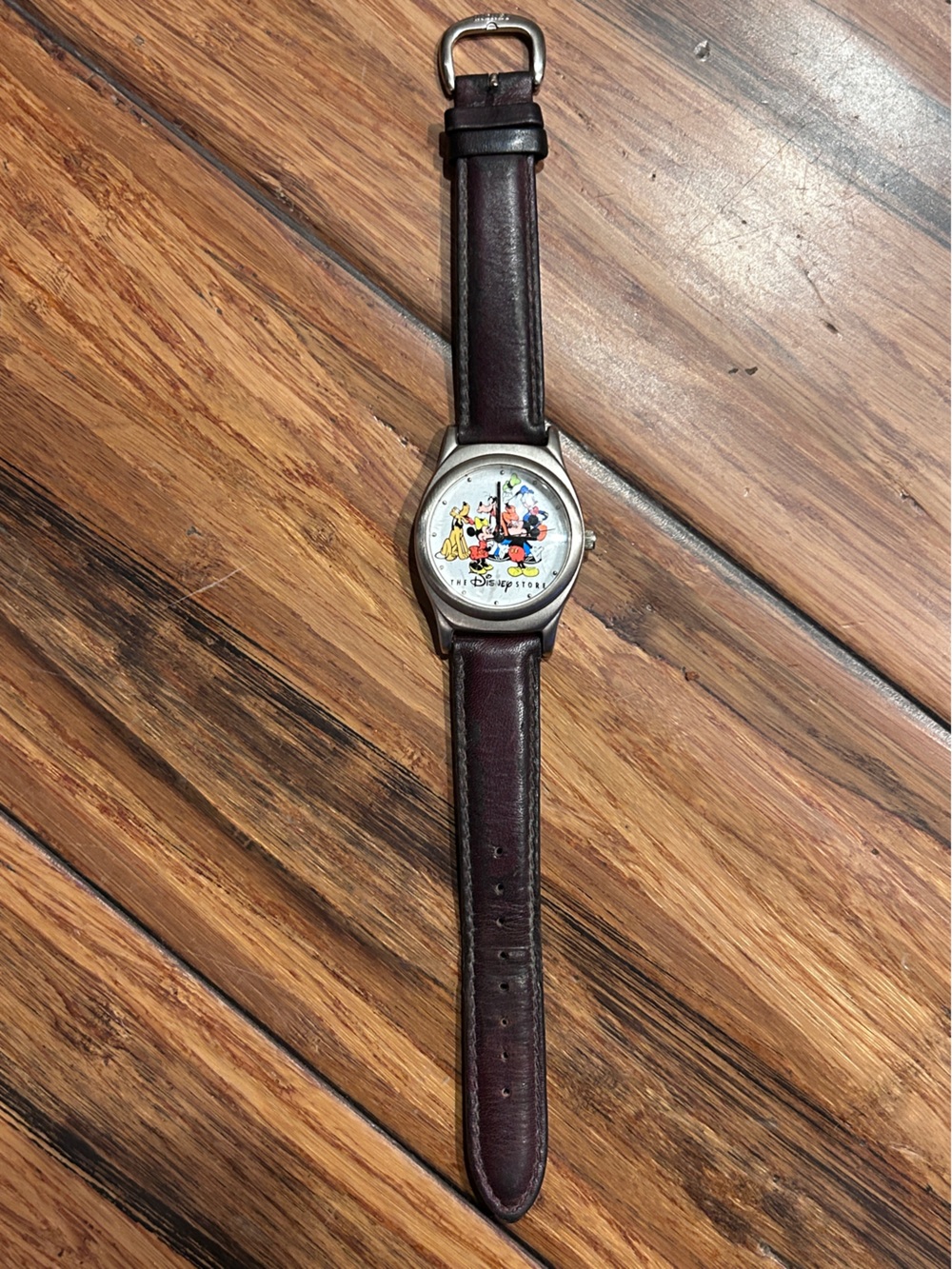 Vintage 90s Disney Store Silver Watch with leather band.